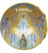 // medalie,Lourdes // Oraşul Lourdes este un loc de pelerinaj important din Franţa.